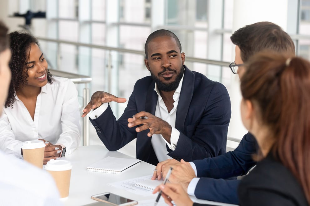 Black-millennial-boss-leading-corporate-team