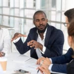 Black-millennial-boss-leading-corporate-team-150x150